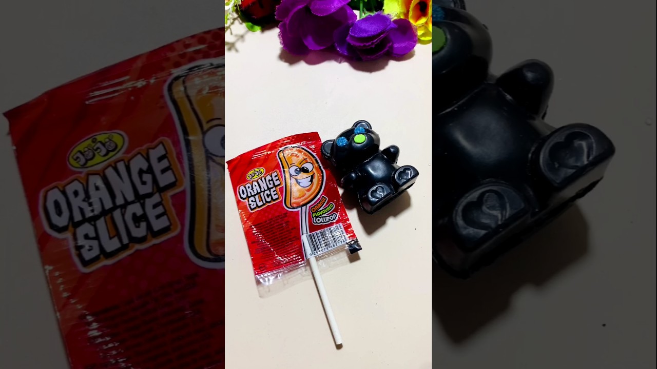 today surprise Orange 🍊 slice lollipop 🍭 with gems unboxing shorts lollipop gems
